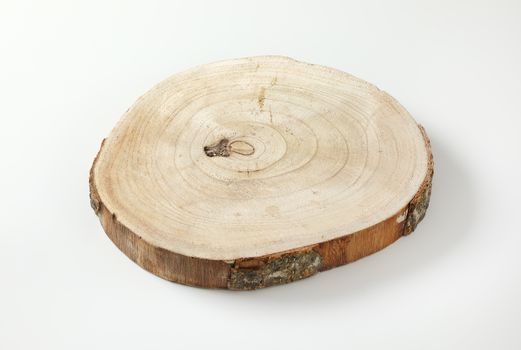 Natural live edge round wood slab with growth rings