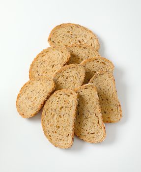 Thin slices of whole grain bread