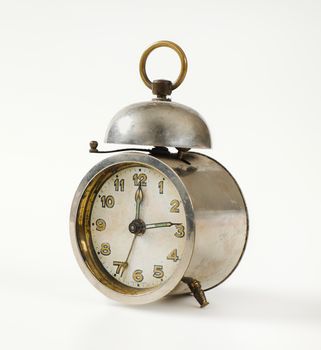 Old mechanical alarm clock with one bell
