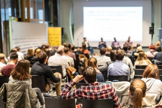 Round table discussion at business convention and Presentation. Audience at the conference hall. Business and entrepreneurship symposium.