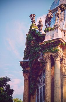 Beautiful side view of the pillars and sculptures of Vajdahunyad Castle, currently the agricultural museum in Budapest, Hungary.