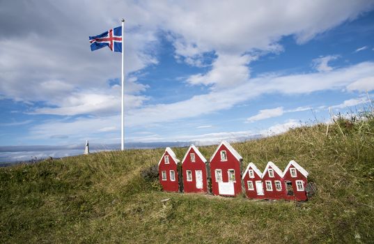 Small House at Strandarkirkja, Selvogur, Iceland. With White clouds and blue sky.