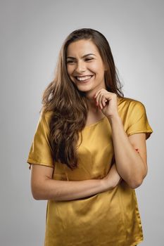 Beautiful young woman with a great smile laughing