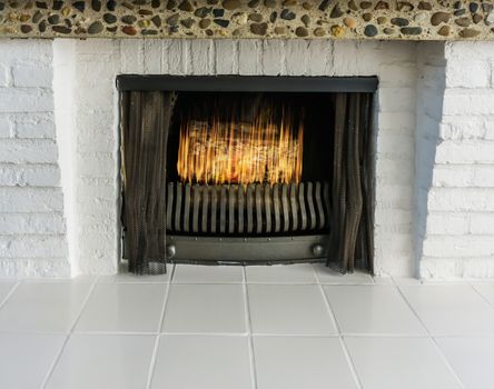 Burning fire place with white bricks and white tiling Retro style but modern look background