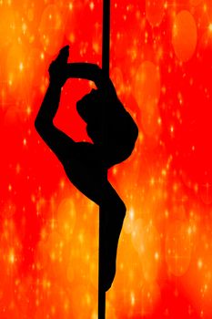 sexy young girl silhouette hanging in a dancing pole while bending her leg isolated on a red background with lights