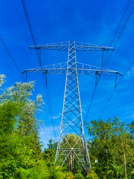 electricity transmission tower with power cables sky line view