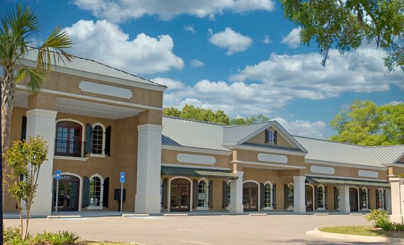 A new strip shopping center with blank signs