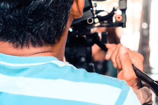 Film industry. Filming with professional camera background