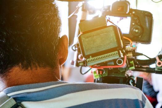 Film industry. Filming with professional camera background