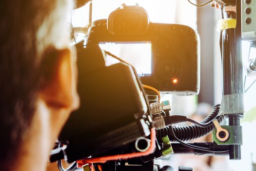 Film industry. Filming with professional camera background