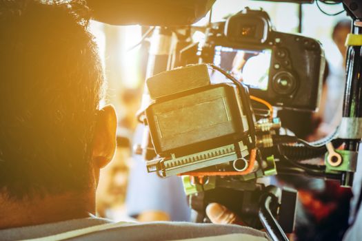 Film industry. Filming with professional camera background