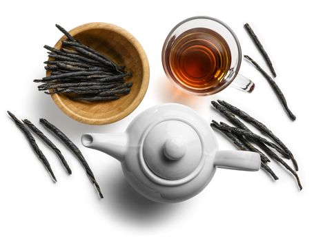 Tea Kuding on a white background. The view from the top.