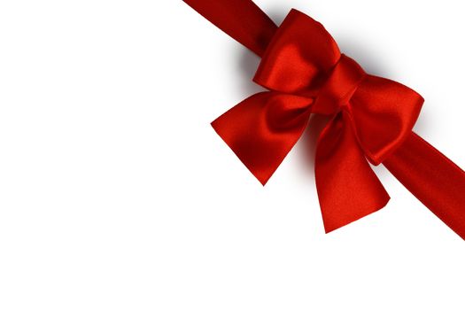 Red satin ribbon bow isolated on white background