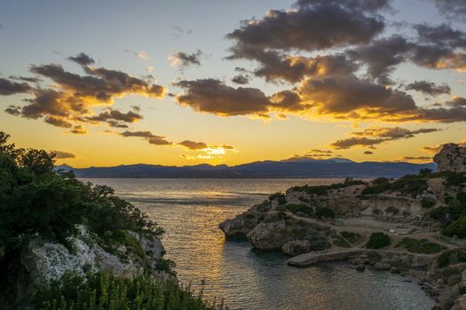 Sunset at Ancient place Hraion Paradise Beach, Greece.