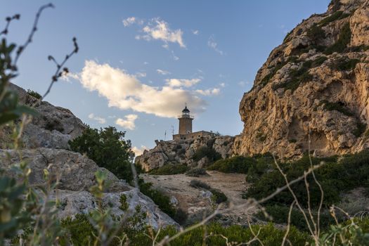 Cape Melagkavi Lighthouse also known as Cape Ireon Light on a headland overlooking eastern Gulf of Corinth, Greece.