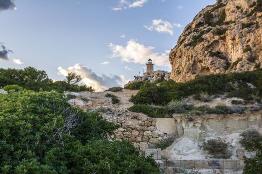 Cape Melagkavi Lighthouse also known as Cape Ireon Light on a headland overlooking eastern Gulf of Corinth, Greece.