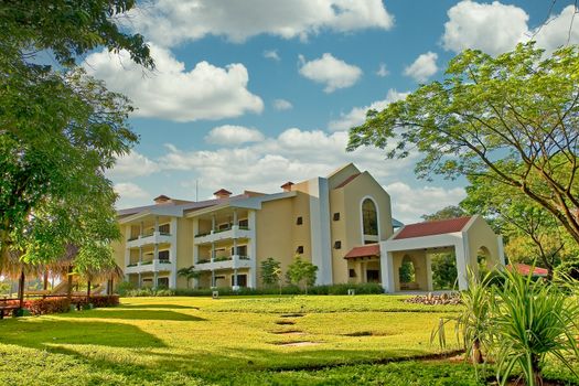 A luxury resort hotel on landscaped grounds