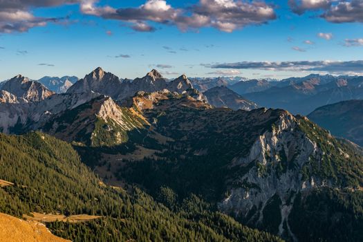 Atmospheric sunset in the mountains of the Tannheim Valley in Austria.