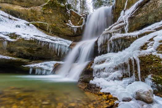 Big icy waterfall near Scheidegg in the Allgau