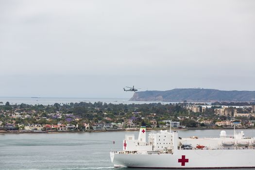 United States Naval Ship Mercy sailing into San Diego Harbor