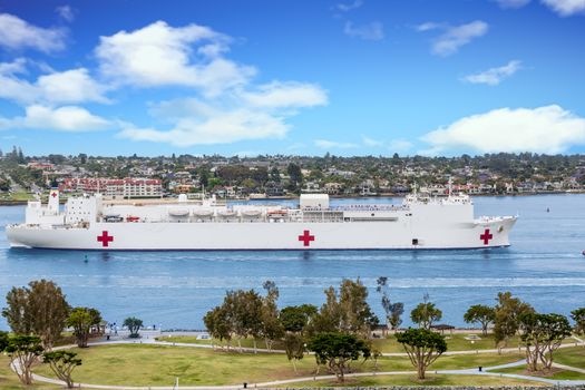 United States Naval Ship Mercy sailing into San Diego Harbor