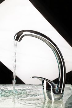 Water mixer and fruits on a studio background