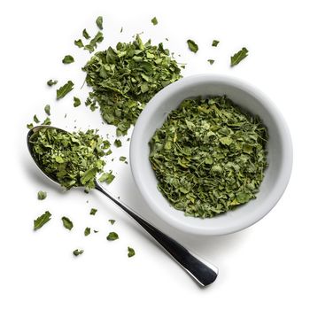 Dried Moringa on a white background. The view from the top.