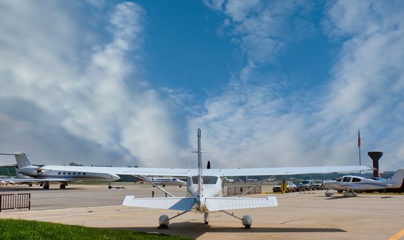 A prop plane at a regional airport from the rear