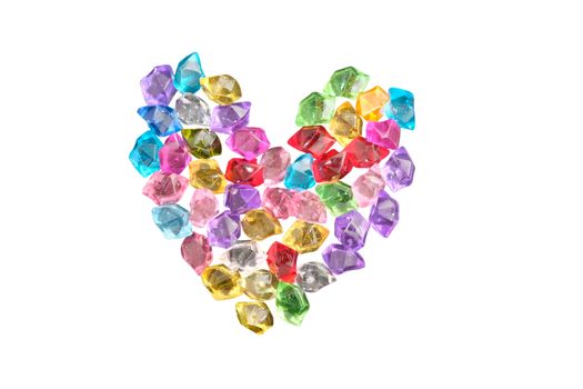 heart made of precious stones on white background