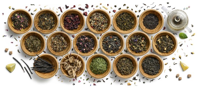 Large assortment of tea on a white background. The view from the top.