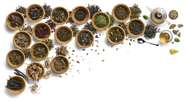 Large assortment of tea on a white background. The view from the top.