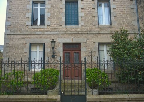 Traditional french stone building with many windows