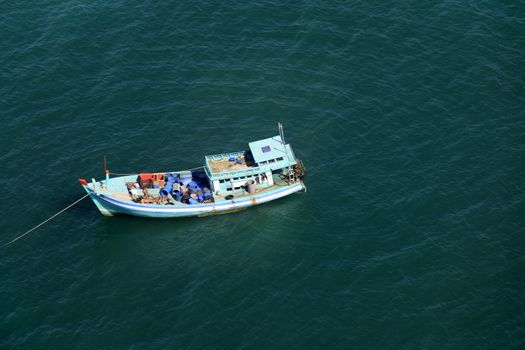 Aerial view  boat at the turquoise sea in Vietnam, Phu Quoc
