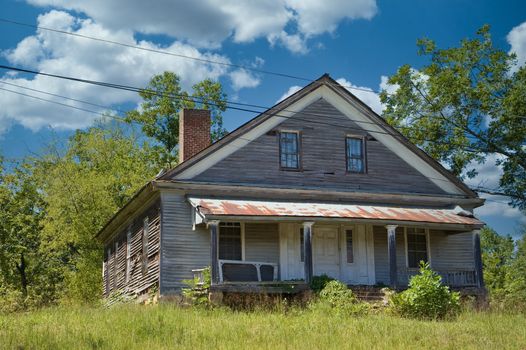 An old abandoned house on a hill