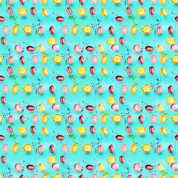 Abstract seamless pattern with flying colored macaroons, holiday concept