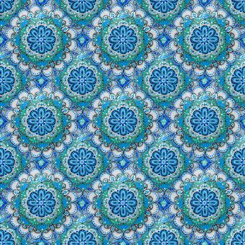 Seamless background from a set of decorative ceramic dishes hand-painted with acrylic paints with a floral pattern.