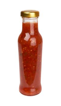 bottle of hot sauce is spilling liquid on white background