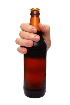 hand holding a beer bottle without label isolated on white background