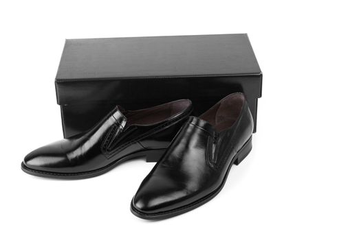 Black leather men shoes with box isolated on white background