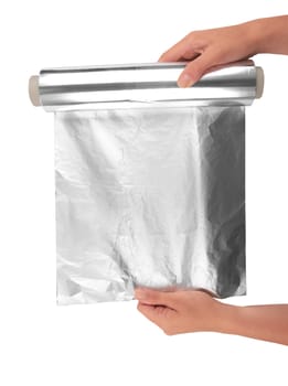 woman holding a roll of aluminum foil 