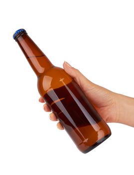 hand holding a beer bottle without label isolated on white background