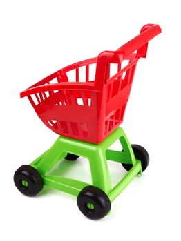 Toy shopping cart isolated on white background