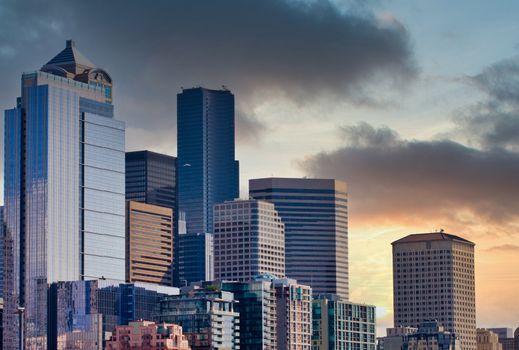 The skyline of seattle on a sunset sky