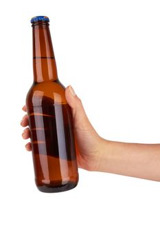 hand holding a brown beer bottle without label isolated on white background
