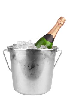 Champagne bottle in ice isolated on white background 