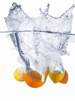 Fresh fruits in water splash 