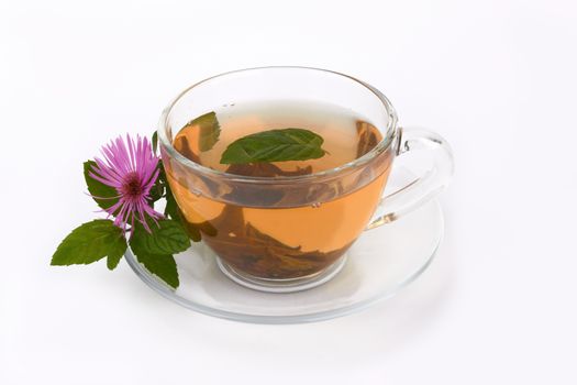 tea in glass cup with mint leaf
