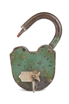 old padlock with key on a white background 