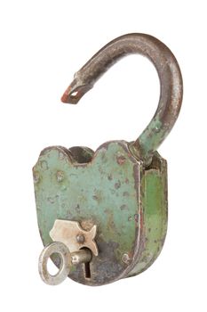 old padlock with key on a white background 