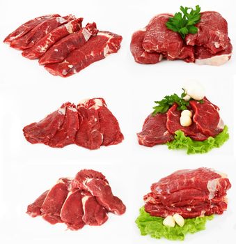 the piece of raw fillet steak with mushroom salad and garlic isolated on white background. 